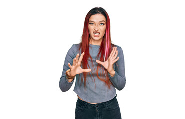 Young caucasian woman wearing casual clothes disgusted expression, displeased and fearful doing...