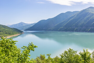 Naklejka premium Zhinvali reservoir, lake landscape with mountains, Georgian military road. Georgia.