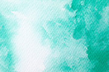 Green or turquoise watercolor background. Aquarelle hand painted texture paper. Drawing concept