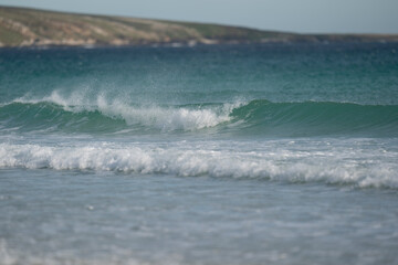 Waves breaking on the beach