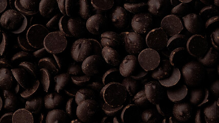 dark chocolate chips top view. confectionery concept