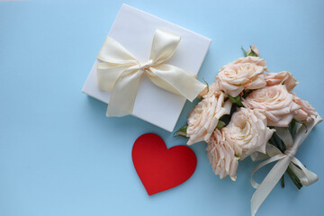 Happy Valentine's Day greeting card. bouquet of flowers and red heart on white background 