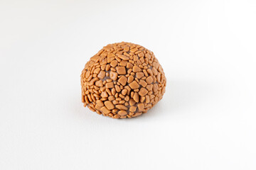 Brigadeiro, handmade chocolate bonbon isolated on white background. Brazilian sweet