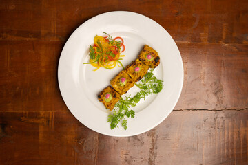 Chicken skew Kebab.Traditional Indian dish cooked on charcoal and flame.top down photo