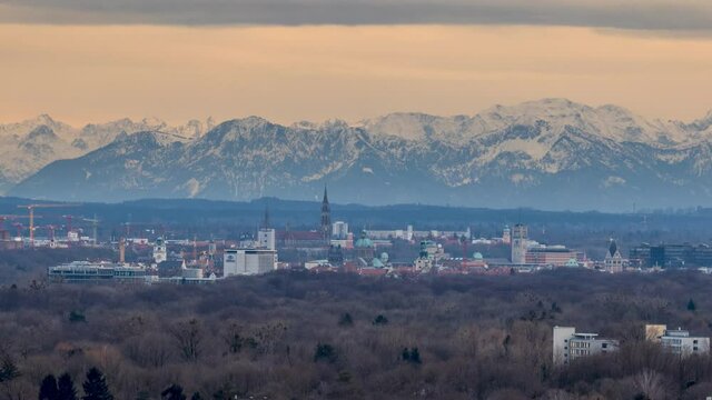 Munich skyline view time lapse view from above aps mountains.