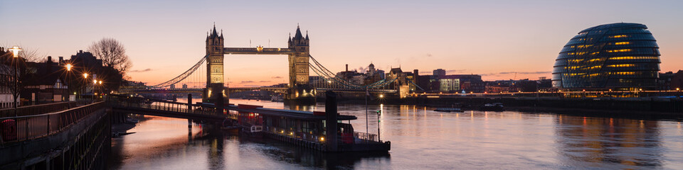 Naklejka premium London - Panorama view along the river thames showing Tower Bridge and City Hall with Tower Millennium Pier in the foreground