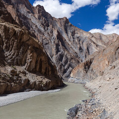 Beautiful road in Zanskar valley, Ladakh, India. Moto travel in North India. Road construction from Padum to Lamayuru.