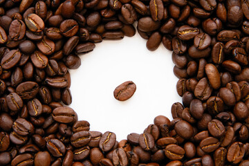 Coffee beans isolated on white background with copyspace for text. Coffee background or texture concept.