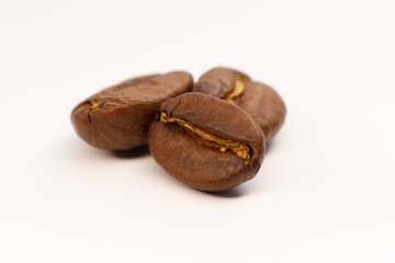 roasted coffee beans isolated on white background cutout