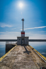 Fototapeta na wymiar small lighthouse at the marine