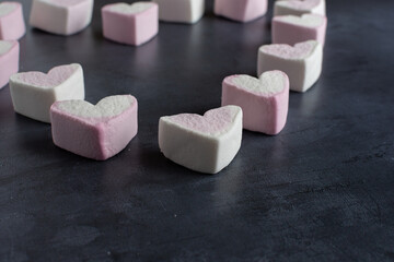 Love heart marshmallows in the shape of a heart viewed from the side