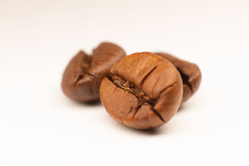 roasted coffee beans isolated on white background cutout