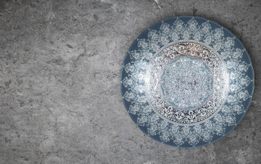 top view of traditional asian plates on gray stone table with copy space