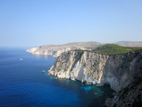 Beautiful west cliff coast at Zakynthos (Zante) island. Rocky steep cliffs on the wild western Zakynthos. Kambi Schiza bay, Ionian Island, Greece, Europe