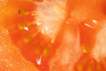 a close-up of sliced tomato