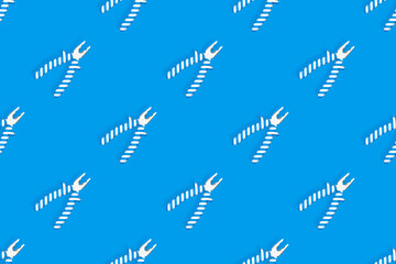 Pliers seamless pattern. Metal pliers with rubber striped grips. Background made of tools. 