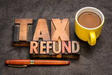 tax refund  banner - word abstract in vintage letterpress printing blocks against textured paper...