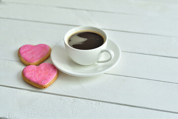 cup of coffee and gingerbread in the form of hearts. Breakfast on Valentine's Day or 8 March.