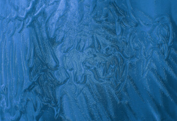 Blue frosty background with crumpled wavy surface. The illustration is with a cool textured effect.