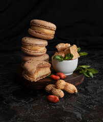 Peanut macarons. Small French cakes. Sweet and colorful French macarons cakes.