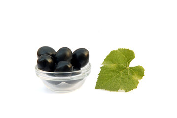 Bunch of dark grapes isolated on the white background.