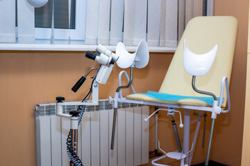 colposcope in gynecologist office. gynecological chair in hospital. Health checkup