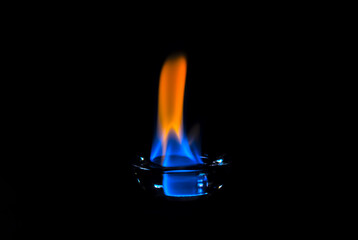 burning match on black background