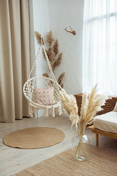 Modern home interior with hanging chair