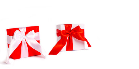 Valentine's Day card. Composition with a gift on a white surface. Copy space. Close-up. Place for your text.