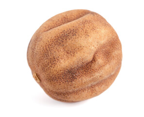 Sun Dried Lime. Dry Lemon (Limu Omani) Isolated on White Background. Also known as Black Lime, Noomi Basra, Limoo Amani and Loomi.