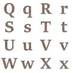 Cracked stone alphabet letters with damaged bevel edge