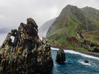 Fototapeta na wymiar Outstanding rocks in the sea on the coast of Madeira Island