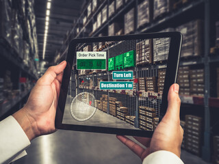 Smart warehouse management system using augmented reality technology to identify package picking and delivery . Future concept of supply chain and logistic business .