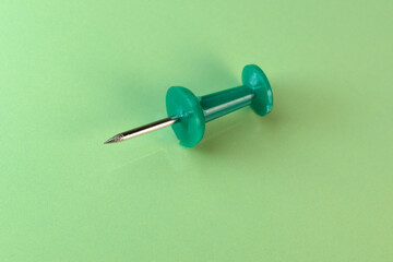 Minimalistic composition on a green background