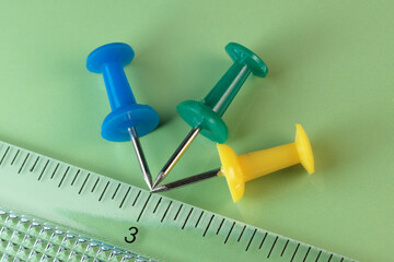 Minimalistic composition on a green background