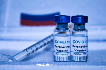 two doses of sputnik covid19 vaccine and syringe packed in protective box