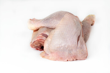 Raw chicken thigh on white background