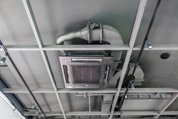 Ceiling mounted cassette type air conditioner in cafe