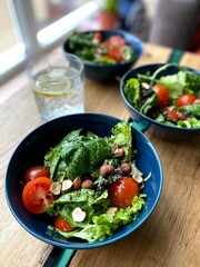 Top view of fresh vegetable salad on a plate on a wooden background. healthy food