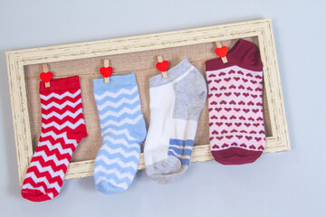 Background with many socks. National Sock day or Odd Socks Day background design element. Bright...