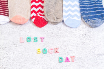 Background with many socks. National Sock day or Odd Socks Day background design element. Bright...