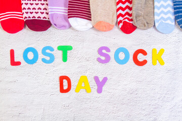 Background with many socks. National Sock day or Odd Socks Day background design element. Bright...