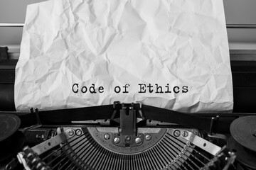 Text Code of Ethics typed on retro typewriter