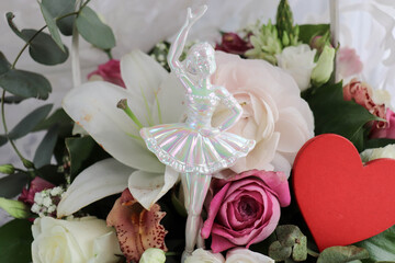 Happy Valentine's Day greeting card. flowers and red heart on a white background. space for text 