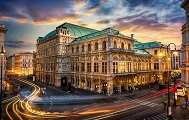 Fototapeten Vienna State Opera. Veinna, Austria. Evening view. The historic opera house is a symbol and landmark of the city of Vienna.  Panoramic view, long exposure. © Tryfonov