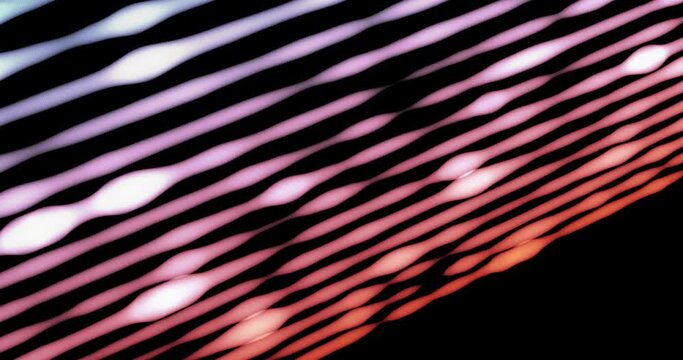 Abstract string of light in black background. Bright particles in row with lumioous effects. Ray of lights pulsating in dark backdrop