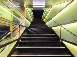Stairs and illuminated walls of the subway