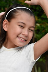 A Cute Tween And Happiness Closeup