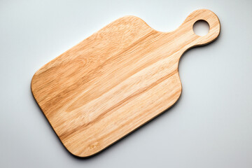Wooden cutting board with handle, flat lay