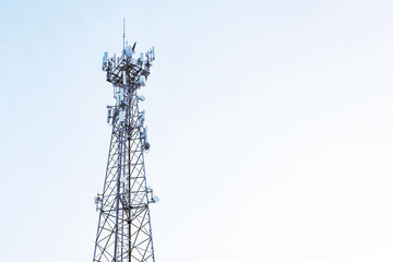 satellite dishes stand against the sky
